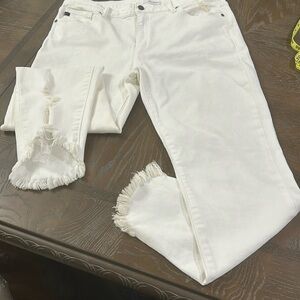 KanCan white pants. They have a few yellow tinted areas. Great condition